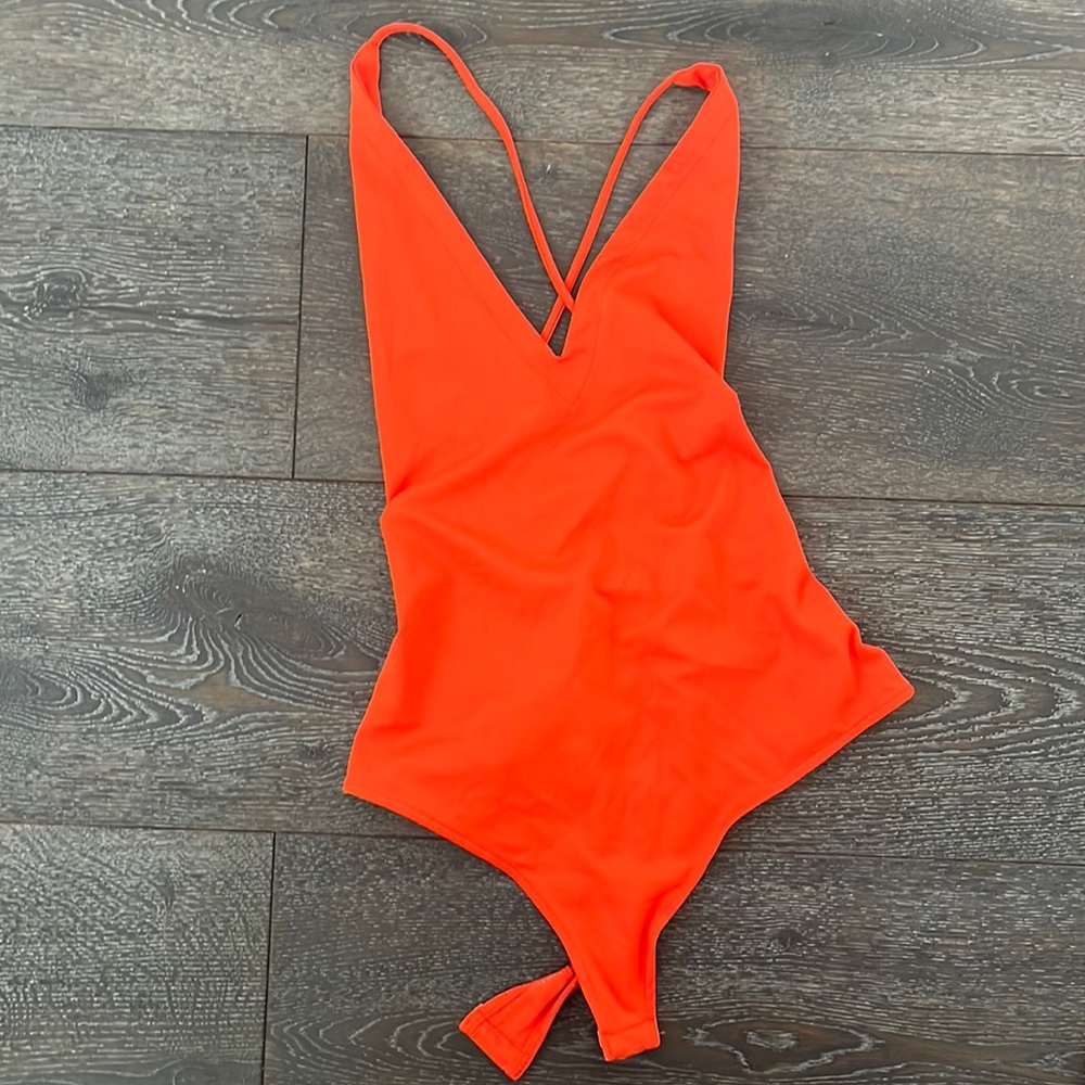 Free People body orange body suit